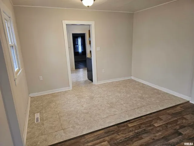 an empty room with an entryway