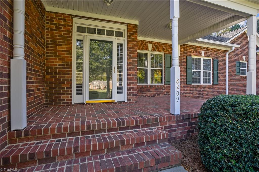 8209 Stafford Mill Road Oak Ridge, NC 27310 - Photo 3 of 50 Front porch