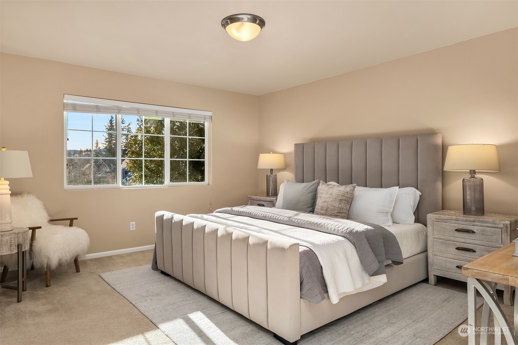 6608 West Crestview Loop Southeast Snoqualmie, WA 98065 - Photo 18 of 29 a bedroom with a bed and window
