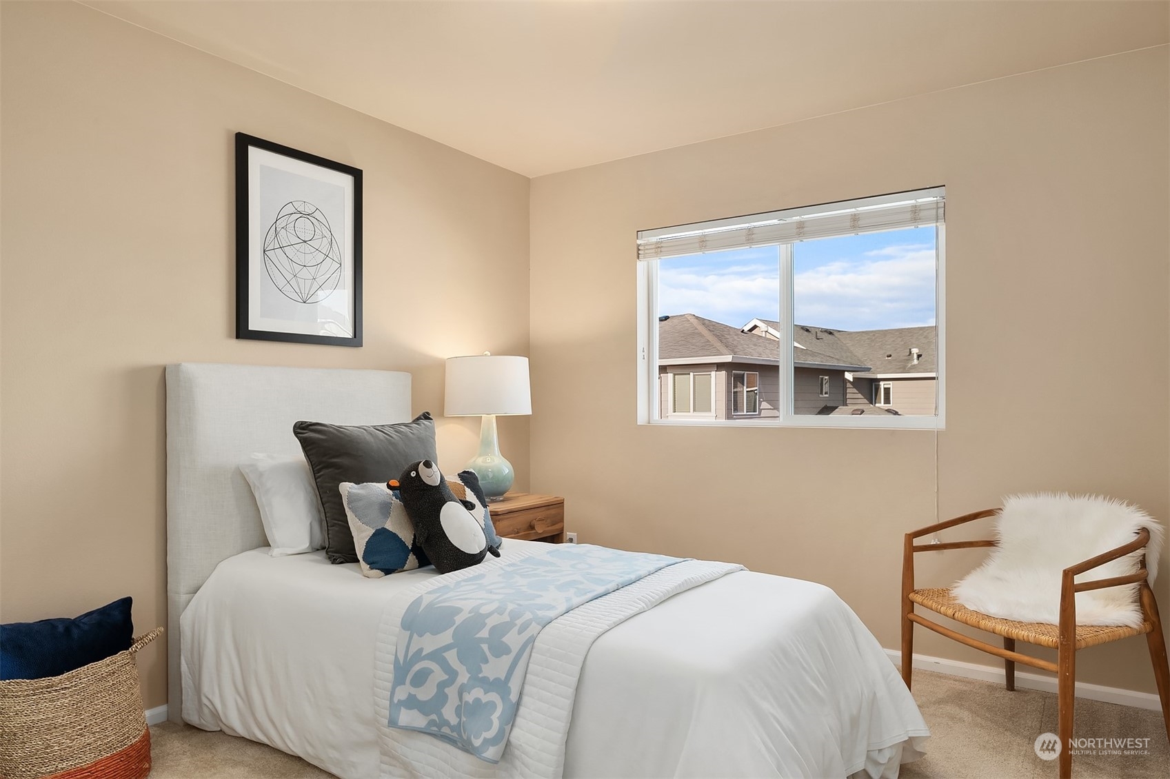 6608 West Crestview Loop Southeast Snoqualmie, WA 98065 - Photo 24 of 29 a bedroom with a bed and wooden floor