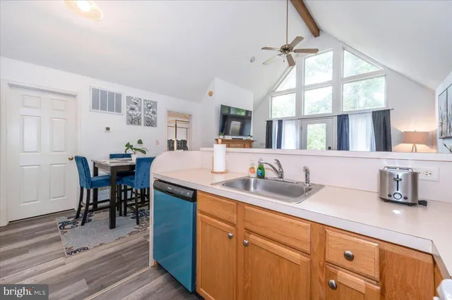 a white refrigerator freezer sitting inside of a kitchen