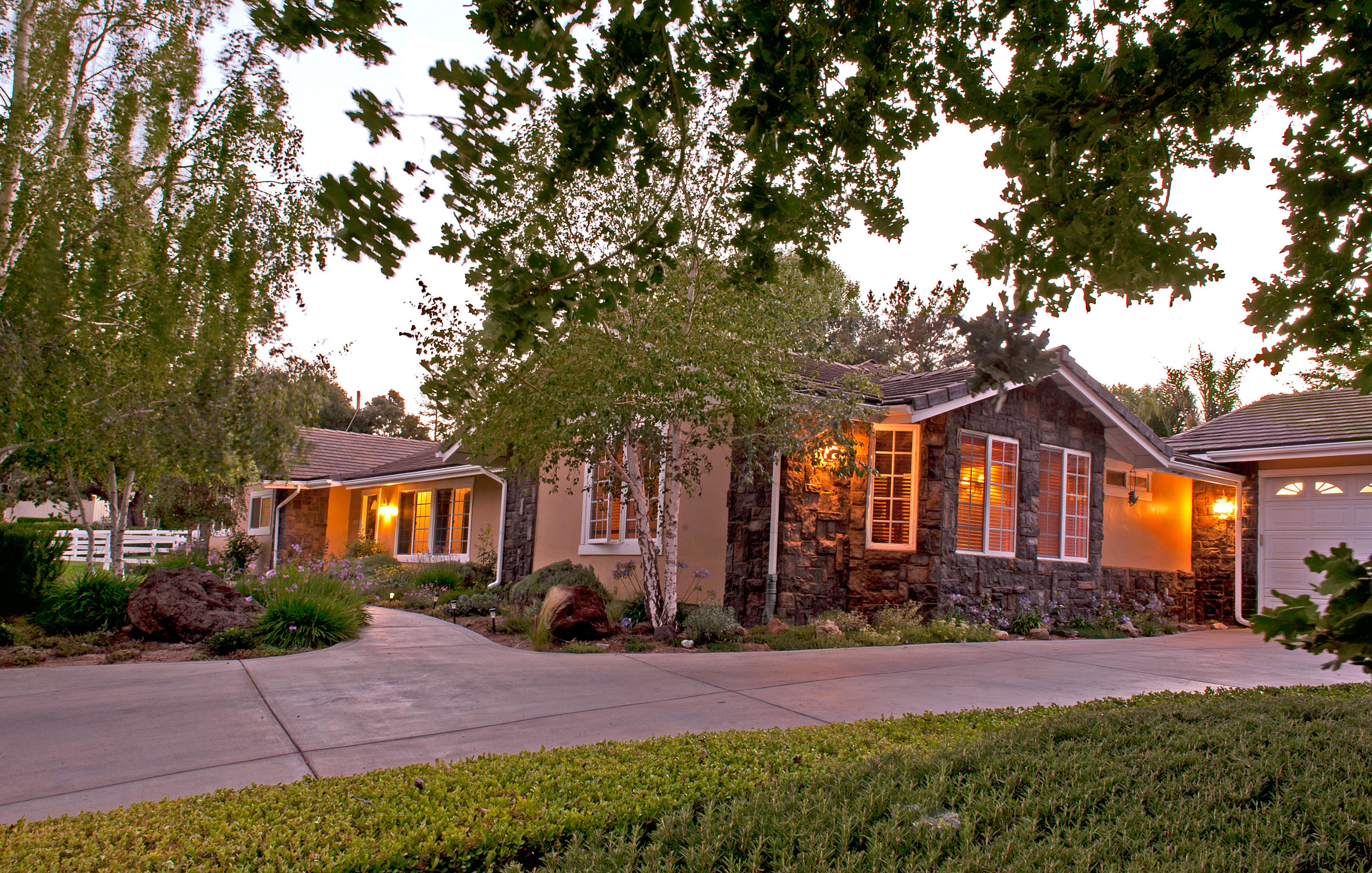 2379 Janin Way Solvang, CA 93463 - Photo 1 of 1 a front view of a house with yard and green space