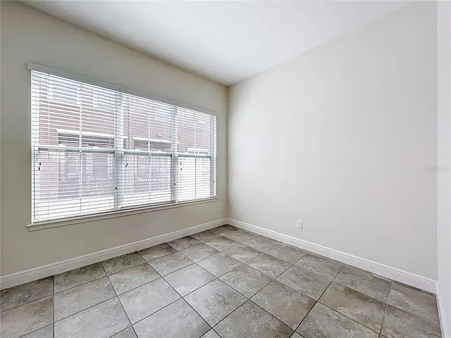 a bathroom with a sink a mirror and a shower