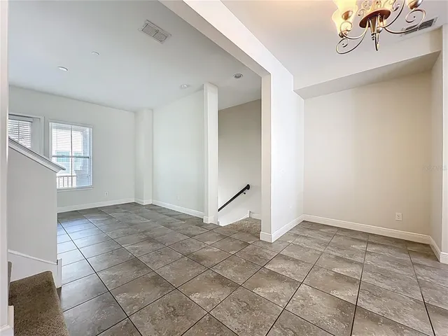 a view of a hallway with the door