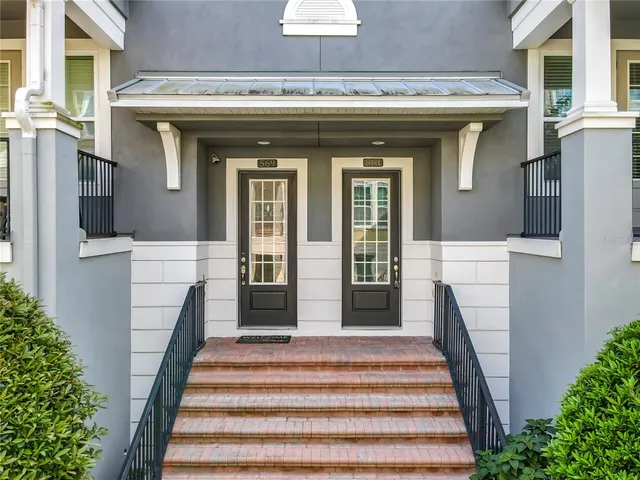 a view of entryway with stairs and a window