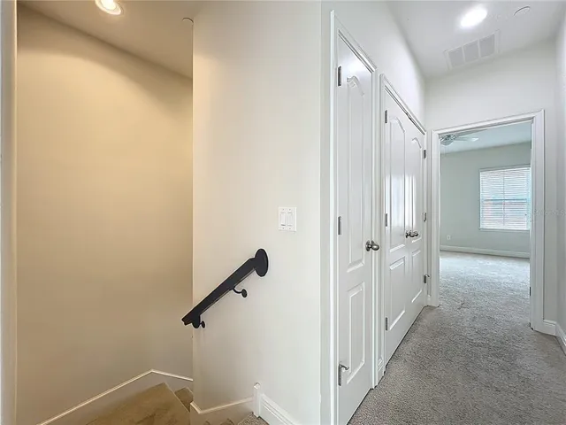 a view of storage and utility room with washer and dryer