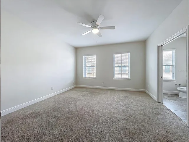a front view of a house with a yard outdoor seating and plants