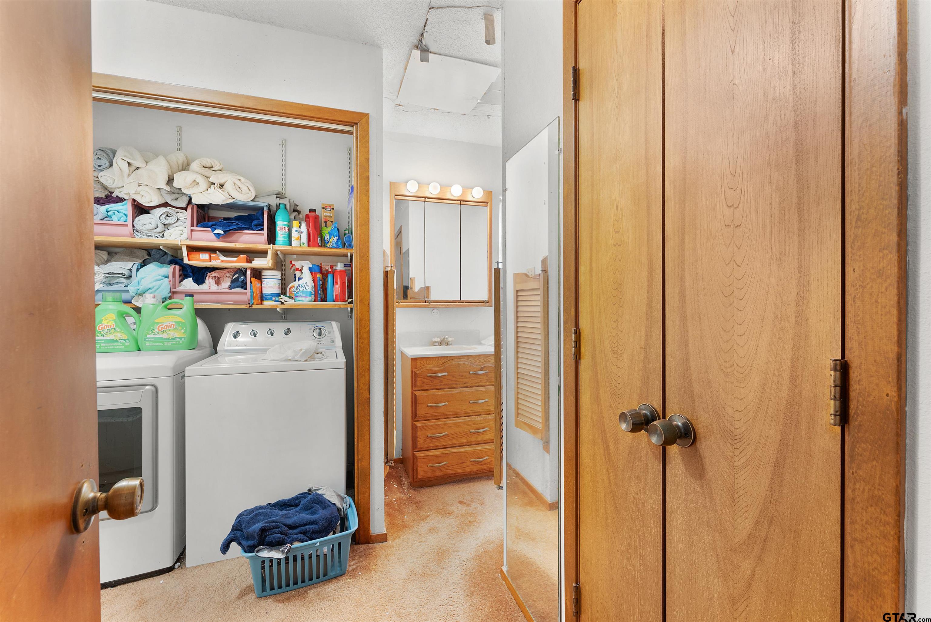 226 County Road 3533 Saltillo, TX 75478 - Photo 21 of 36 a room with storage and utility