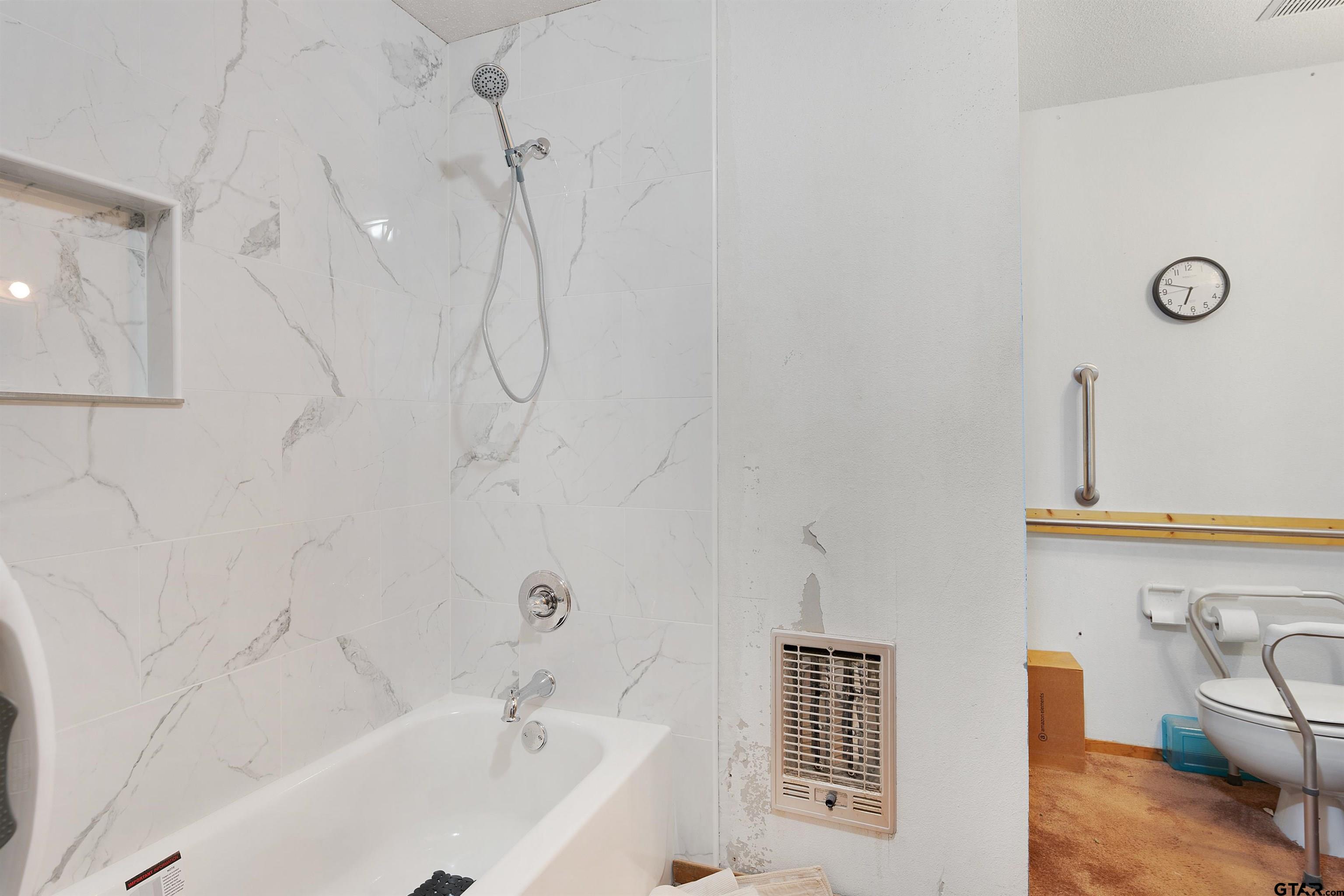 226 County Road 3533 Saltillo, TX 75478 - Photo 23 of 36 a bathroom with a tub sink and a shower