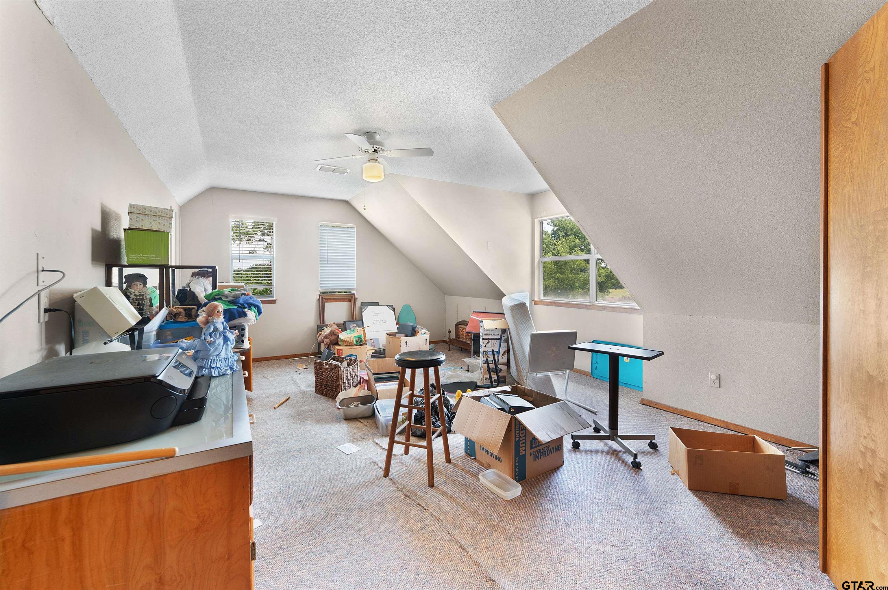 226 County Road 3533 Saltillo, TX 75478 - Photo 26 of 36 a living room with furniture and a large window