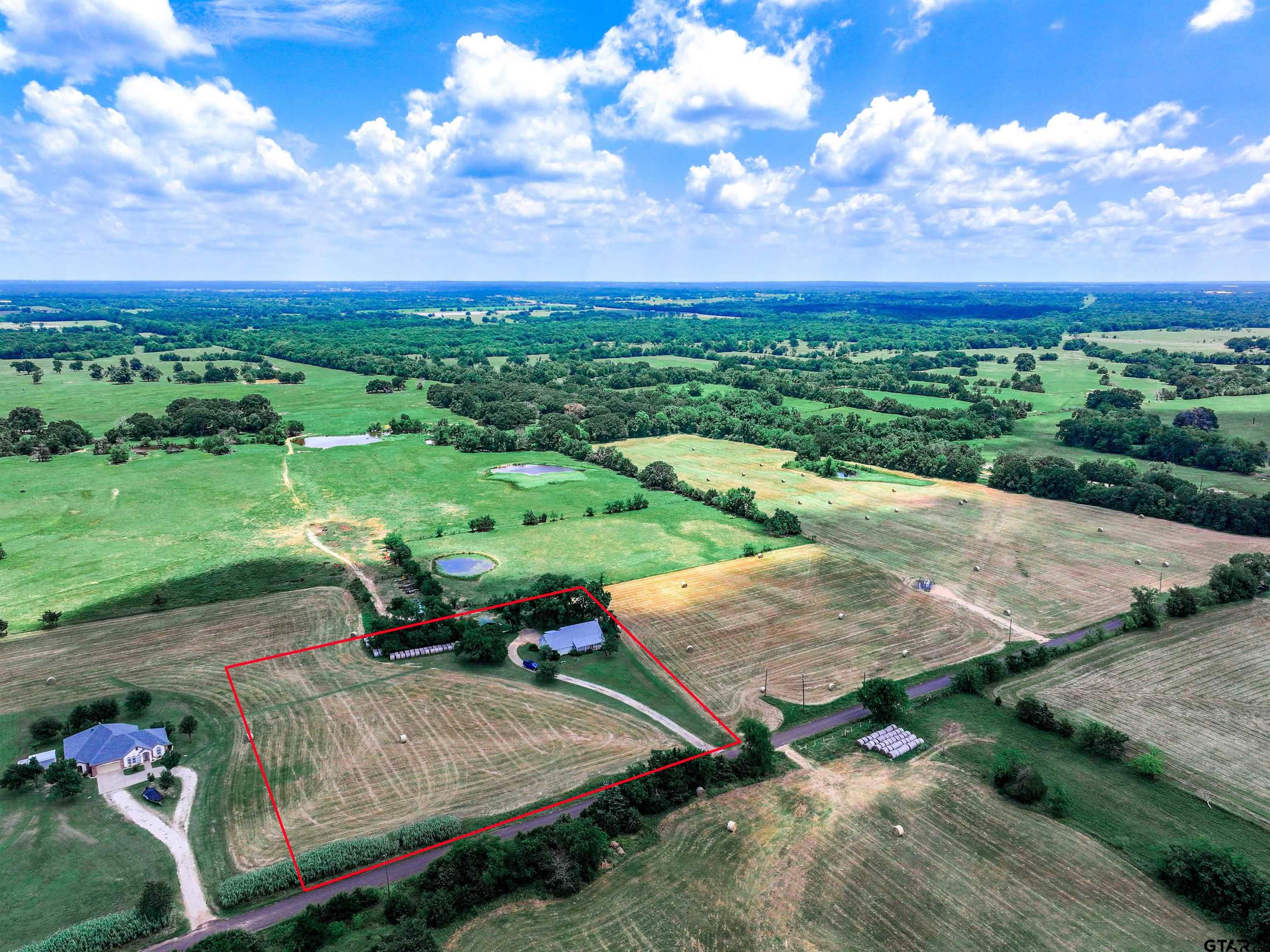 226 County Road 3533 Saltillo, TX 75478 - Photo 30 of 36 an aerial view of a garden with plants