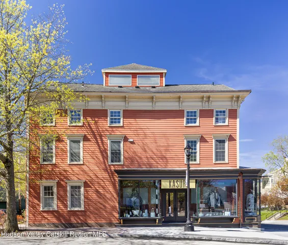 a front view of a building with street view