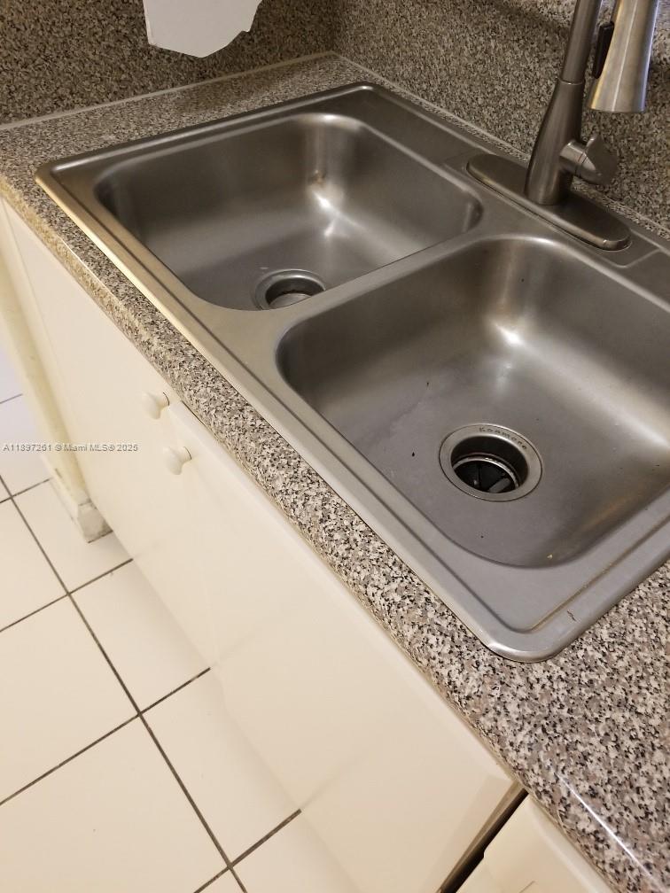 1663 Southeast 27th Drive, Unit 202 Homestead, FL 33035 - Photo 14 of 16 a close view of sink