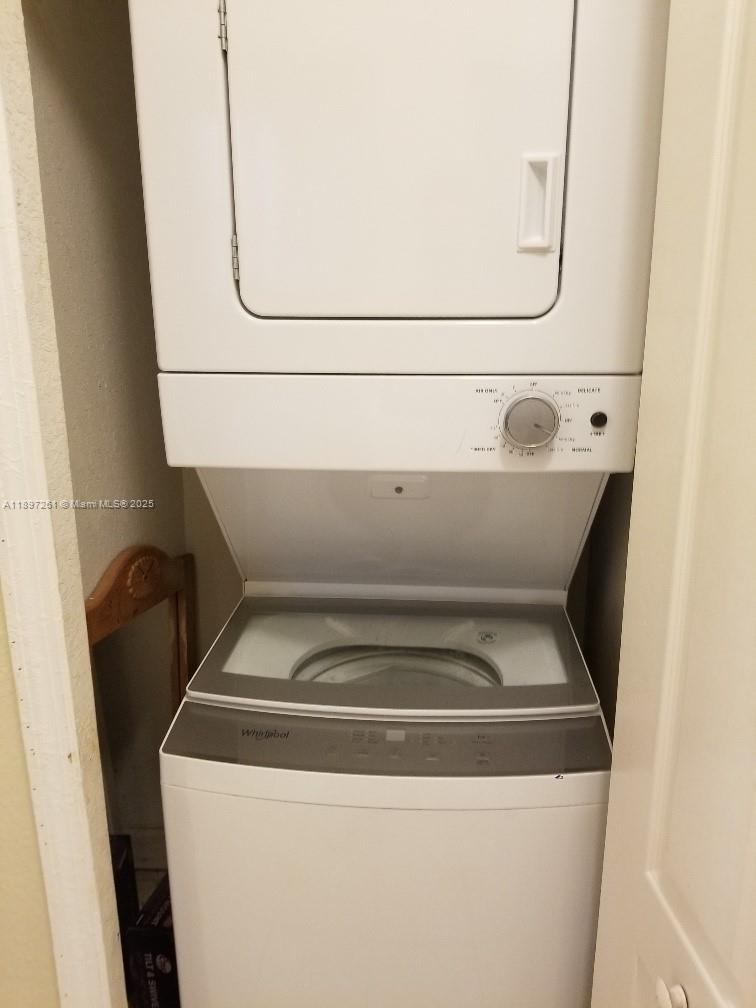 1663 Southeast 27th Drive, Unit 202 Homestead, FL 33035 - Photo 16 of 16 a close up view of washer and dryer