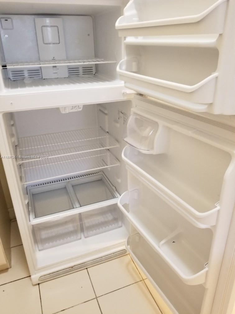 1663 Southeast 27th Drive, Unit 202 Homestead, FL 33035 - Photo 10 of 16 a close up of a bathtub with shower
