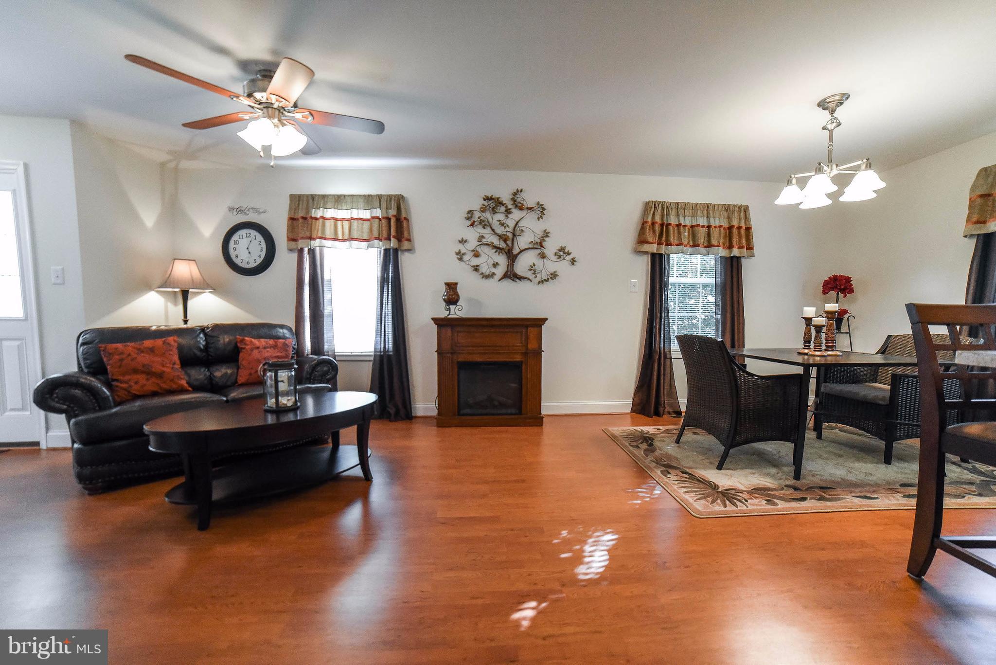 17877 2nd Street Tall Timbers, MD 20690 - Photo 2 of 29 Great room encompasses living, dining, and kitchen