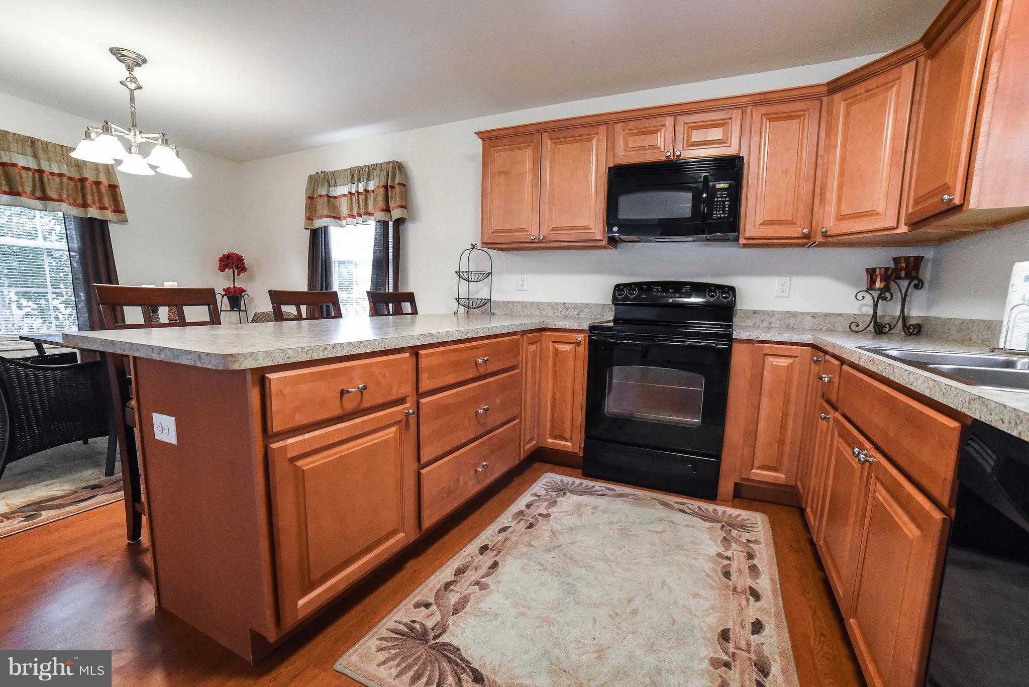 17877 2nd Street Tall Timbers, MD 20690 - Photo 3 of 29 Attractive kitchen has maple cabinets