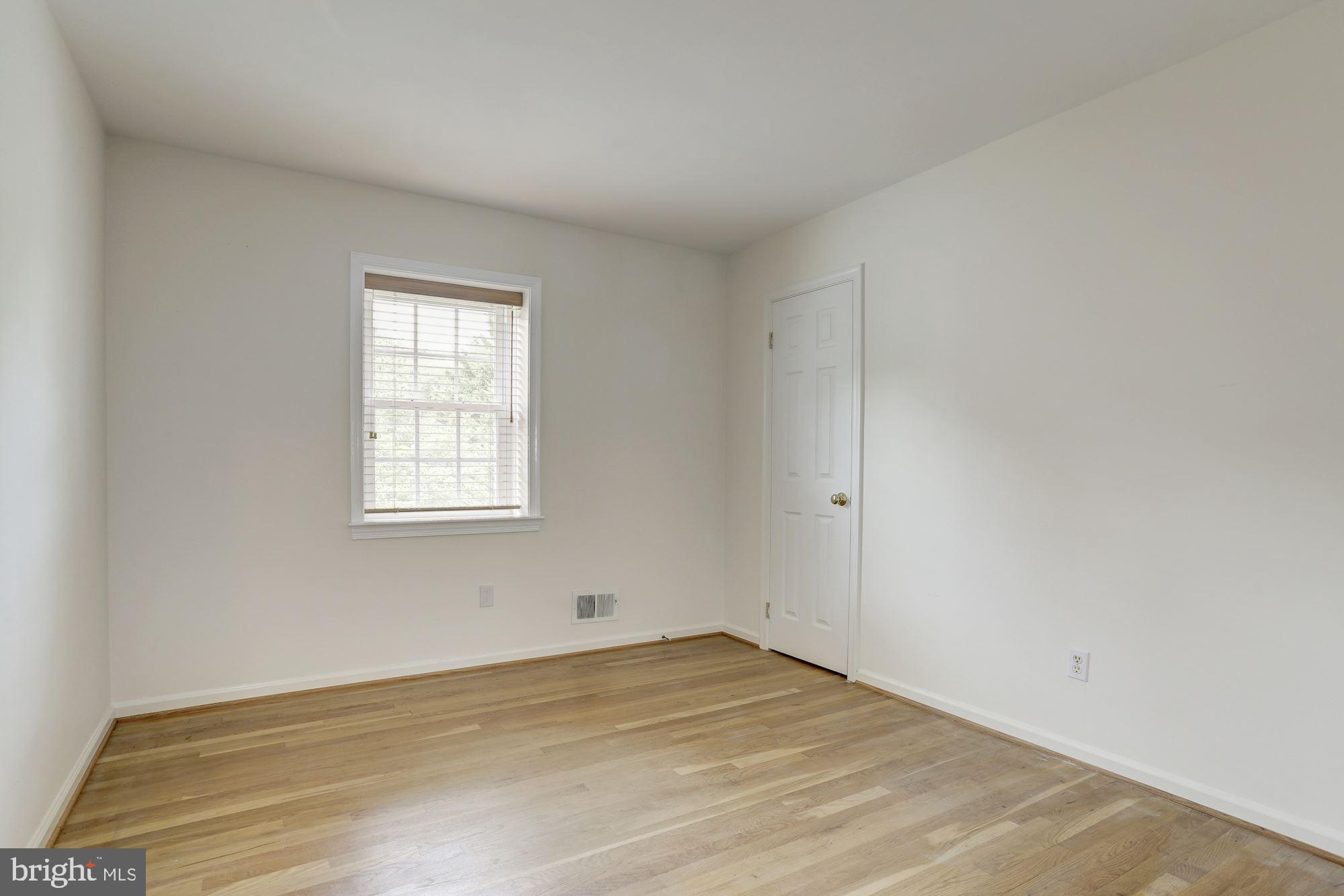 10239 Gainsborough Road Potomac, MD 20854 - Photo 16 of 21 an empty room with a window
