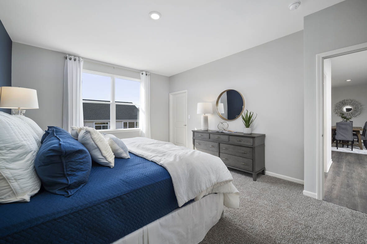 920 Eineke Boulevard Algonquin, IL 60102 - Photo 16 of 27 a bedroom with a bed and a large window