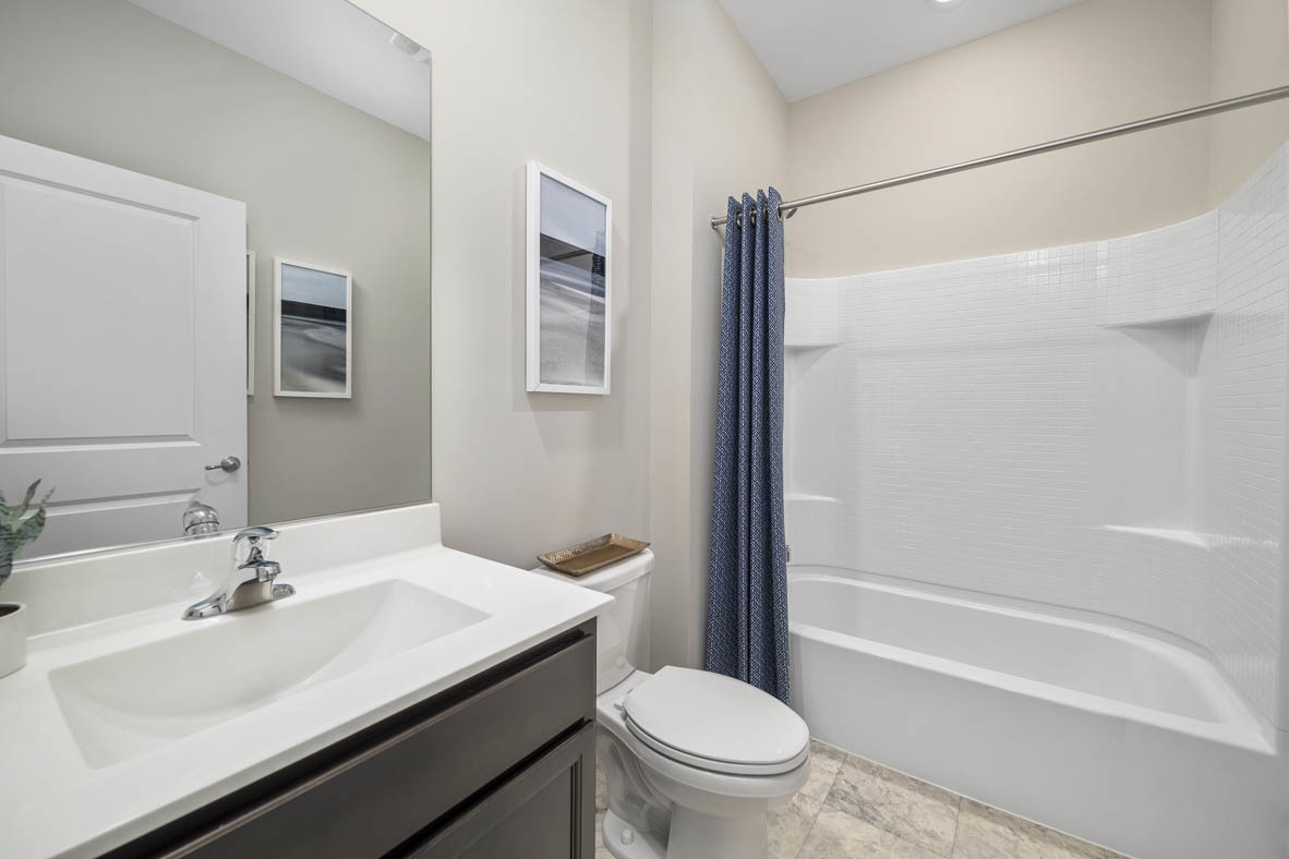 920 Eineke Boulevard Algonquin, IL 60102 - Photo 19 of 27 a bathroom with a sink toilet vanity and shower