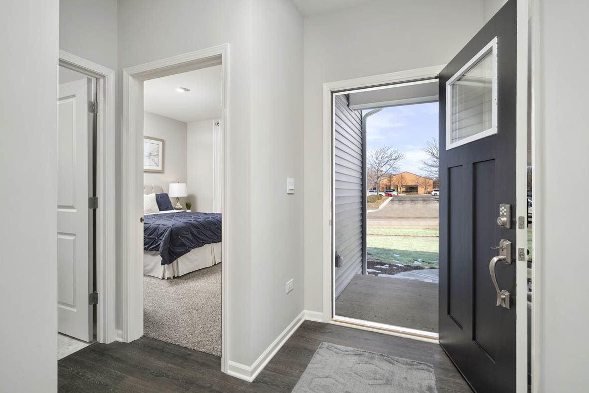 920 Eineke Boulevard Algonquin, IL 60102 - Photo 2 of 27 a view of a bedroom from a hallway