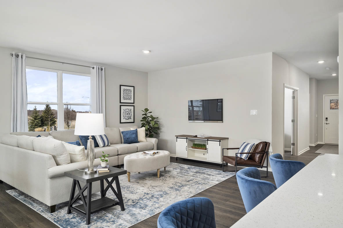920 Eineke Boulevard Algonquin, IL 60102 - Photo 10 of 27 a living room with furniture or couch and a wooden floor