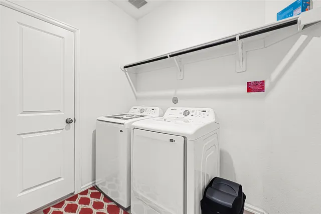 a bathroom with a sink vanity and a mirror