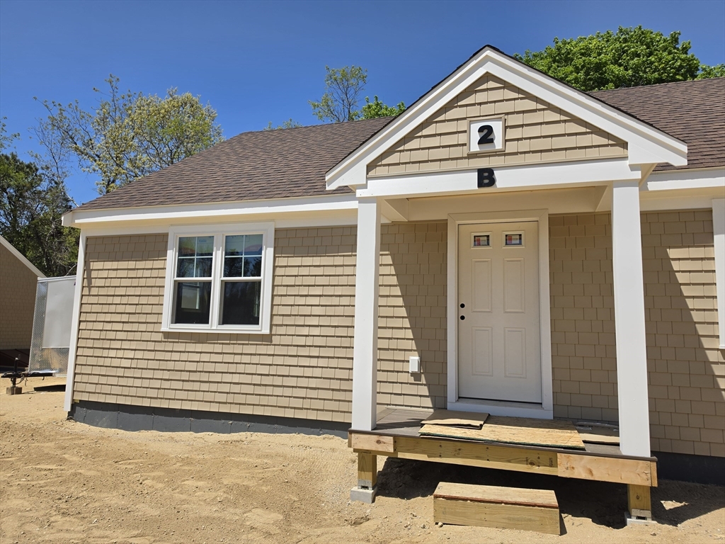 87 Acapesket Road, Unit 2B Falmouth, MA 02536 - Photo 15 of 17 a view of house with street