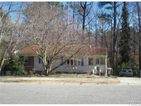 1406 Marlborough Road Raleigh, NC 27610 - Photo 1 of 1 front view of a house with a yard