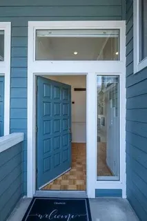 a view of front door and bedroom
