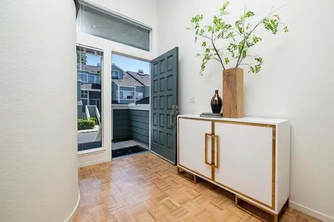 a view of a hallway with closet