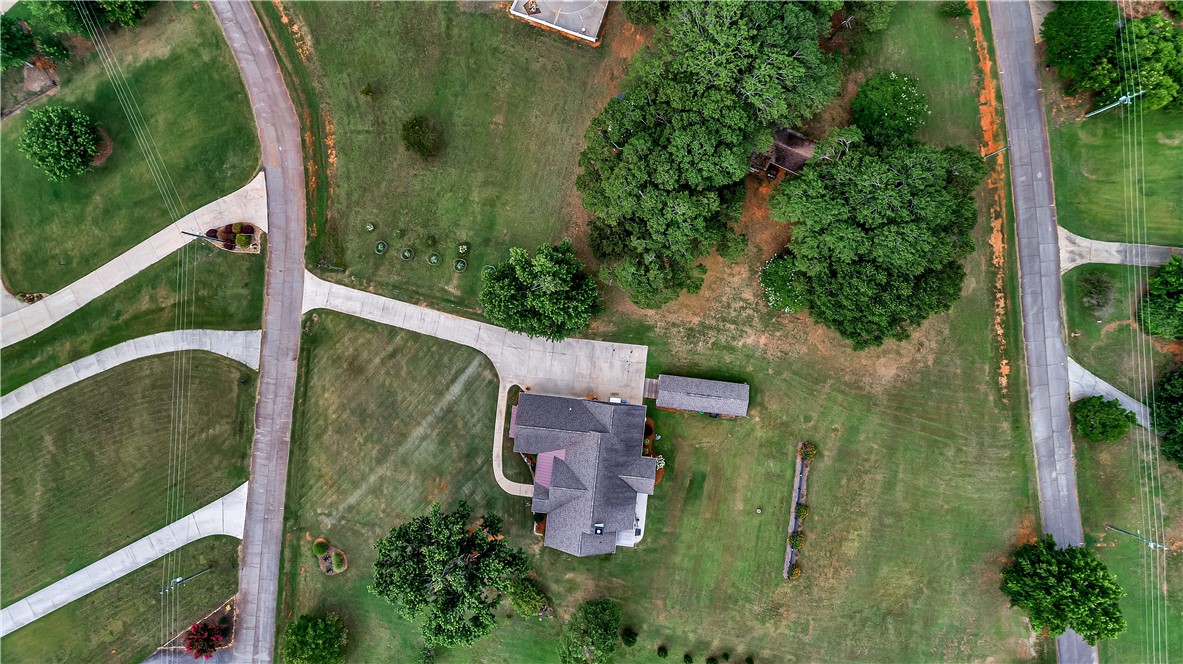 1204 Cherokee Road Townville, SC 29689 - Photo 35 of 44 An aerial perspective reveals a private residence nestled amidst verdant lawns and mature trees.
