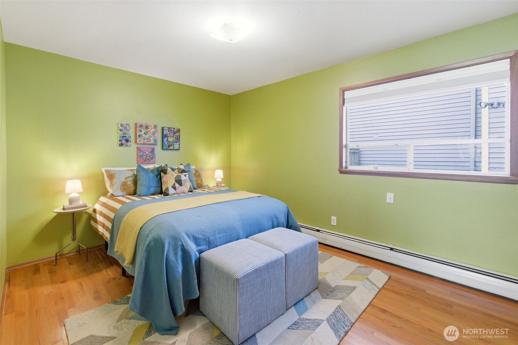 2803 South Walker Street Seattle, WA 98144 - Photo 33 of 40 a bedroom with a bed and a window
