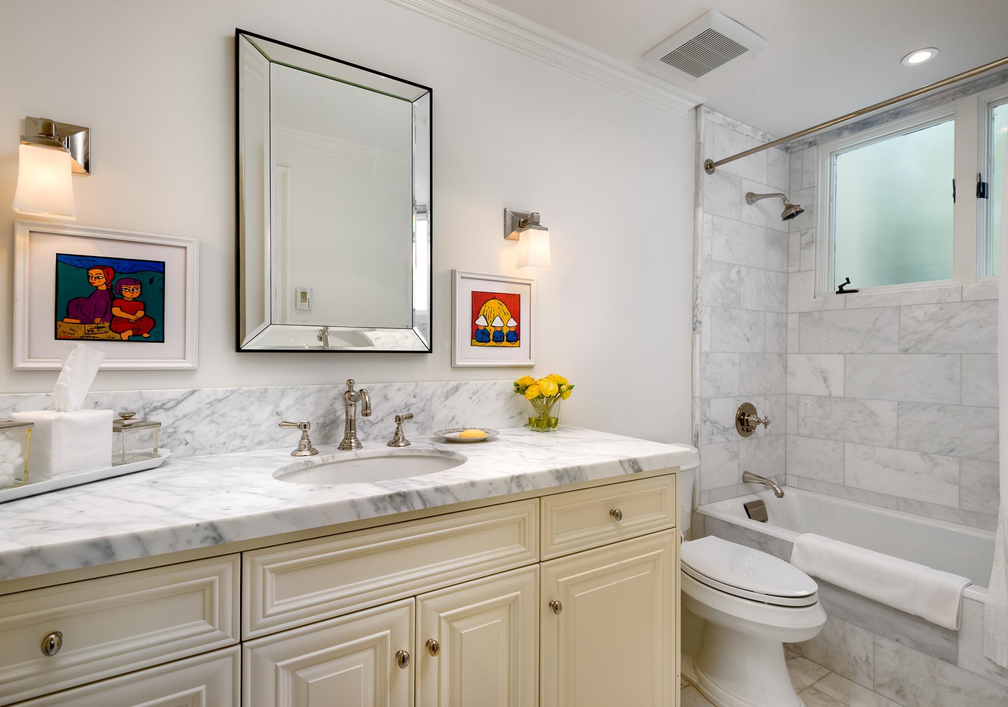 1300 Plaza Pacifica Montecito Ca Montecito, CA 93108 - Photo 14 of 31 a bathroom with a granite countertop sink a toilet and a mirror