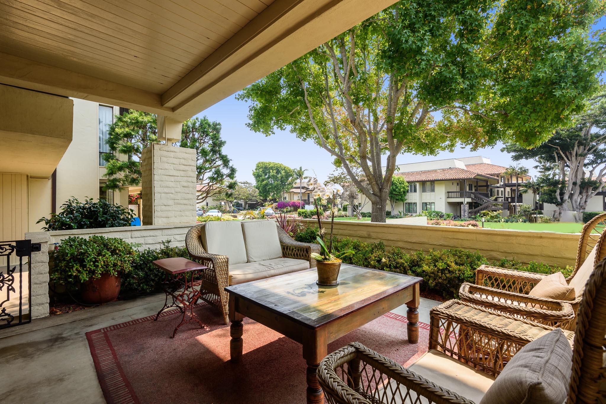 1300 Plaza Pacifica Montecito Ca Montecito, CA 93108 - Photo 20 of 31 a view of a patio with couches table and chairs and potted plants