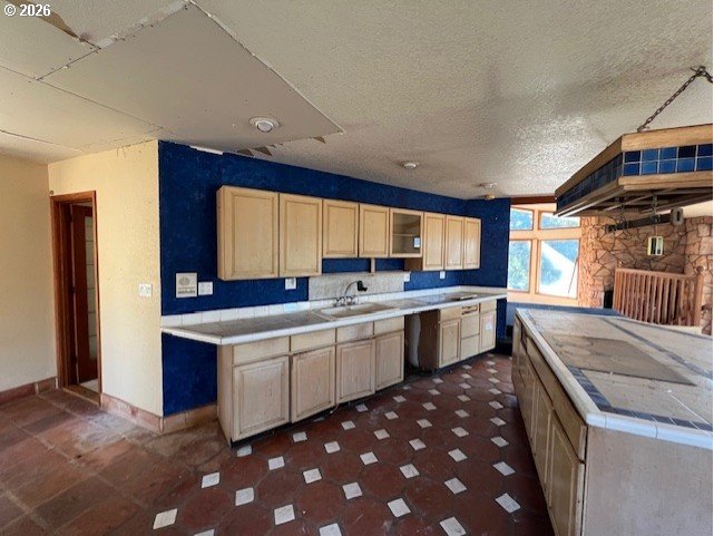 13707 Northwest Bishop Road Hillsboro, OR 97124 - Photo 22 of 45 a kitchen with a sink stove and cabinets