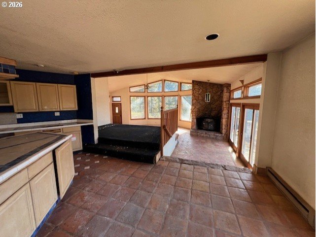 13707 Northwest Bishop Road Hillsboro, OR 97124 - Photo 24 of 45 a kitchen with granite countertop a stove a sink and a refrigerator