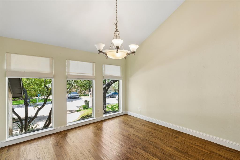 6502 Riverview Lane Dallas, TX 75248 - Photo 18 of 40 Hardwood floors & chandelier