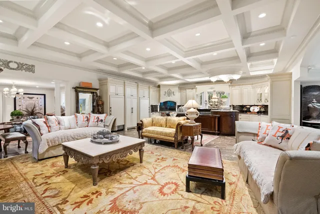 a living room with fireplace furniture and a flat screen tv