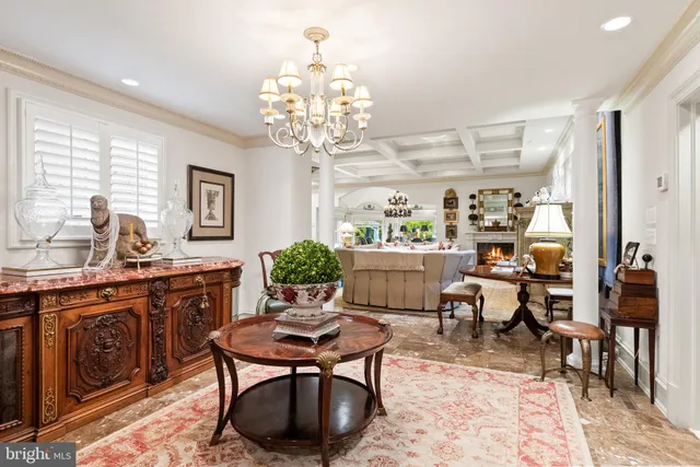 a living room with furniture fireplace and a flat screen tv