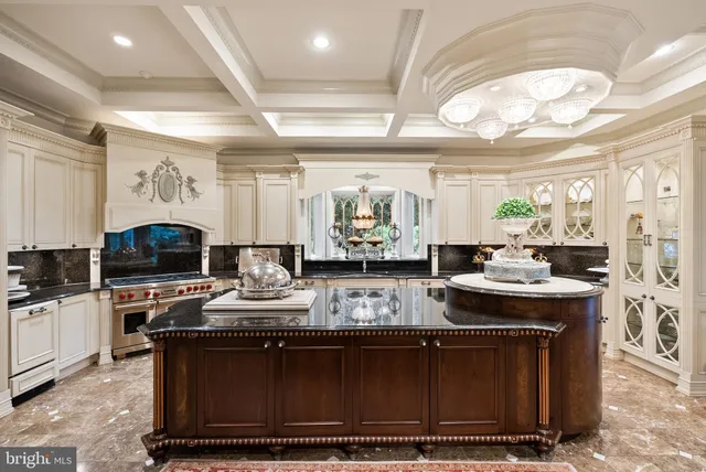 a view of a chandelier in a kitchen