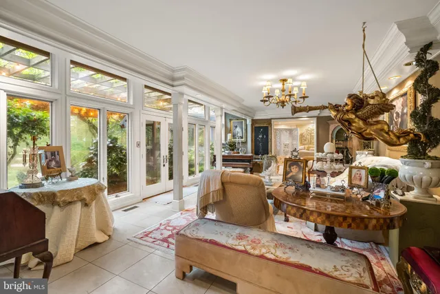 a very nice looking dining room with a table and chairs