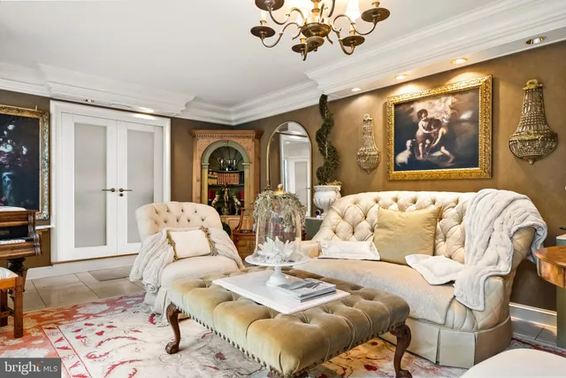 a living room with furniture fireplace and flat screen tv