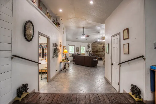 a kitchen with cabinets and window