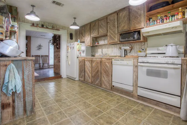 a view of bedroom with furniture and window