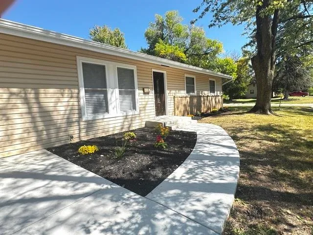 a front view of house with yard