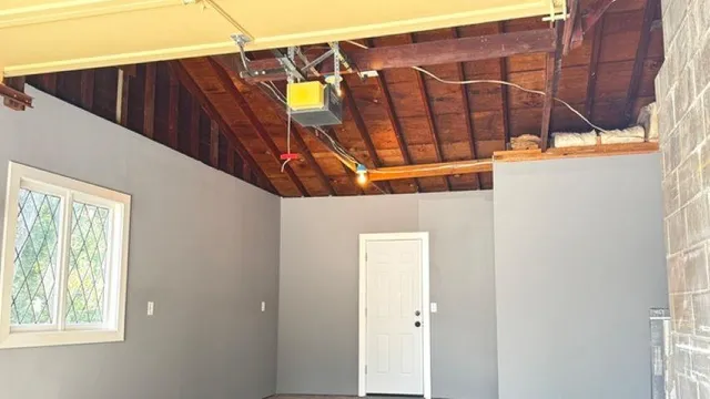 a view of walk in closet with clothes