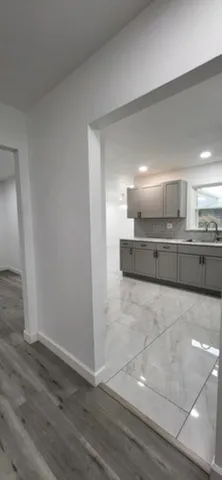 a view of kitchen with wooden floor