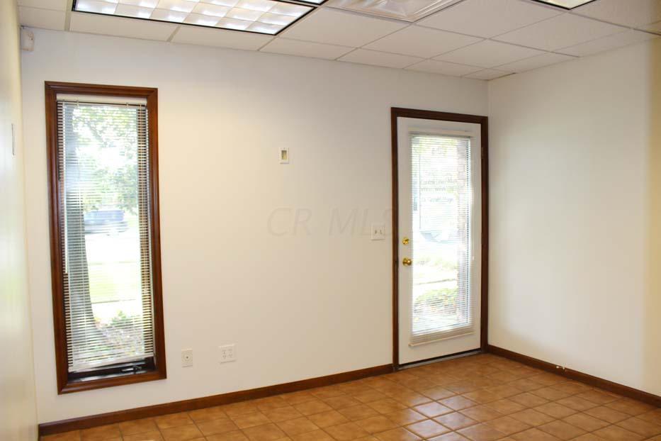 1900 Bethel Road Columbus, OH 43235 - Photo 23 of 24 Ceramic tile flooring. Ivory painted walls. Suspended ceiling. Fluorescent lighting.