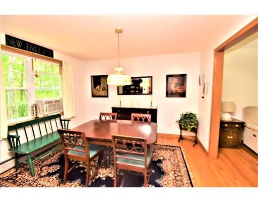 85 Woods Road Northampton, MA 01062 - Photo 11 of 29 a living room with furniture and a flat screen tv